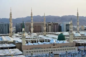 View of Al-Masjid an-Nabawi with green dome and minarets – Ziyarat Places in Madinah